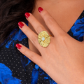 Wearing a gold Cleopatra Radiance Ring